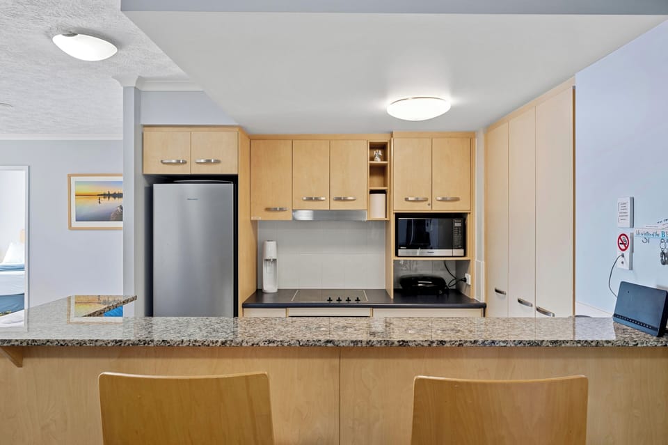 Cook up memories in this sleek kitchen!