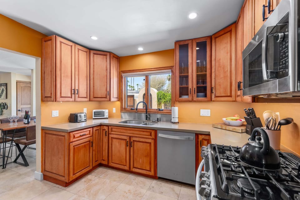 Stainless steel appliances and cooking essentials.