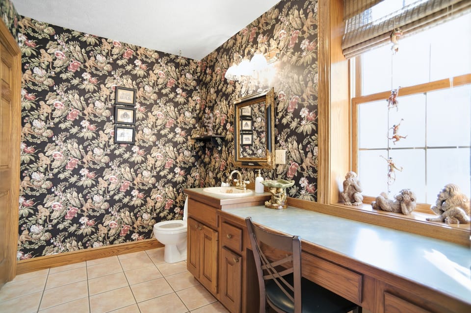 Half bathroom on the 2nd floor - small makeup area and eclectic design