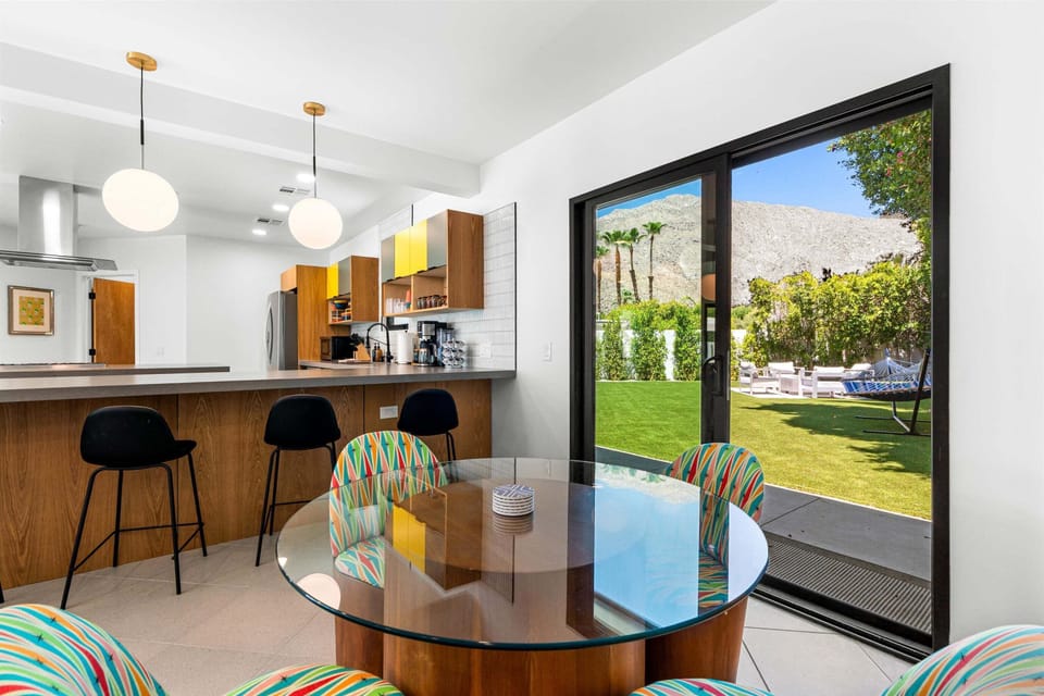 Dining nook and breakfast bar overlooking the backyard