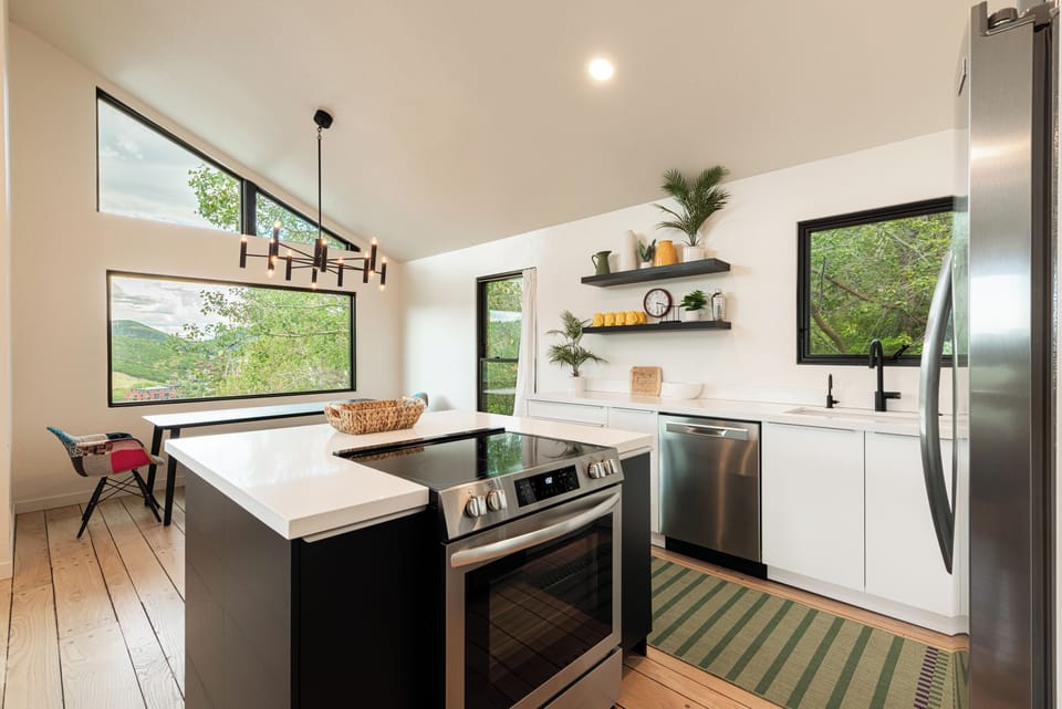 One of two fully equipped kitchens. (B)