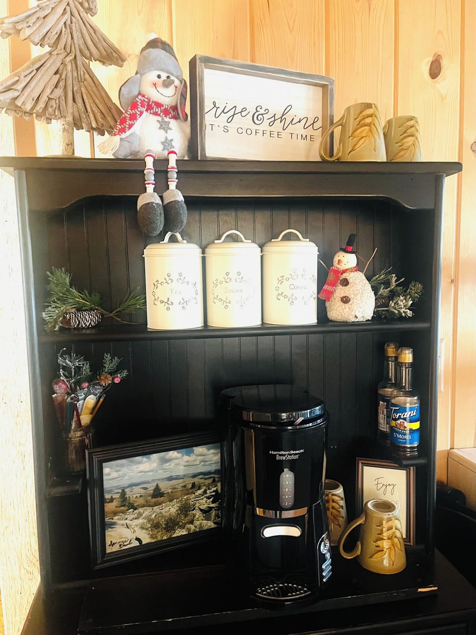 Small coffee bar with coffee, and tea.