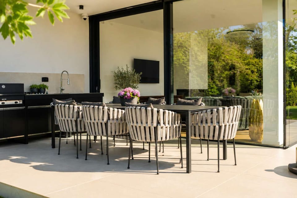 Outdoor dining area with outdoor kitchen