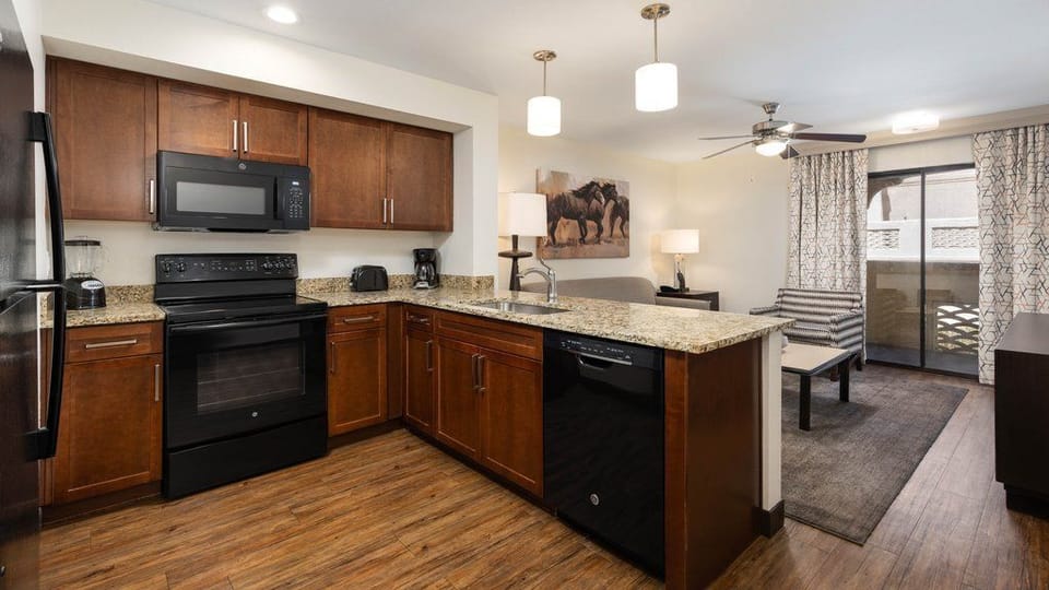 Cook up a storm in the fully equipped kitchen, designed for meals just like home.
