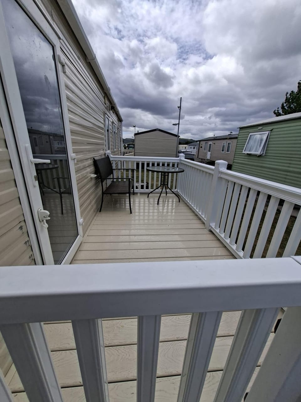Nothing beats having your own private outdoor space to unwind. This lovely gated decking at Ty Mawr is the perfect extension of the living space!
