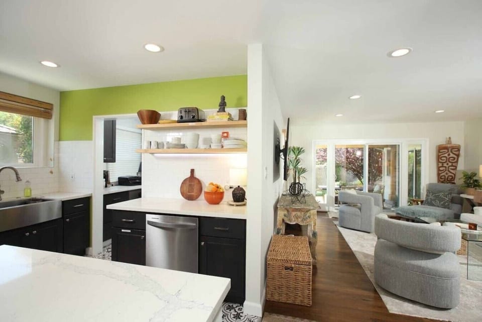 Cook with ease in a designer kitchen featuring a gas stove and brand new cabinetry.