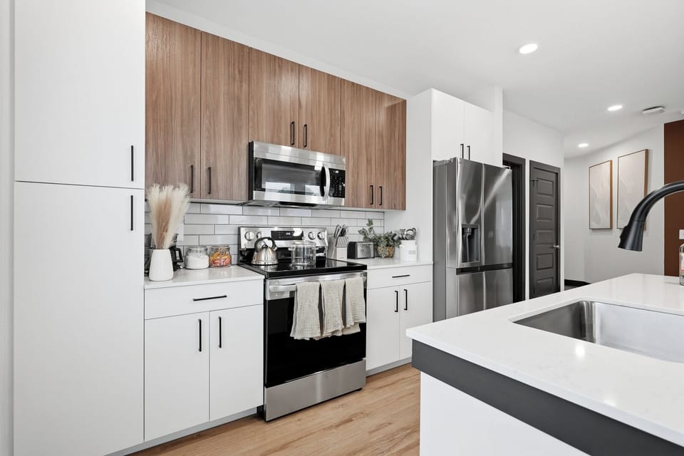 Fully equipped kitchen with stainless steel appliances. 