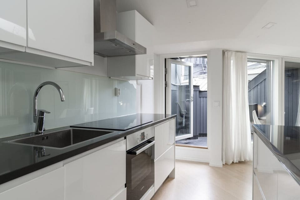 The kitchen expands onto the balcony