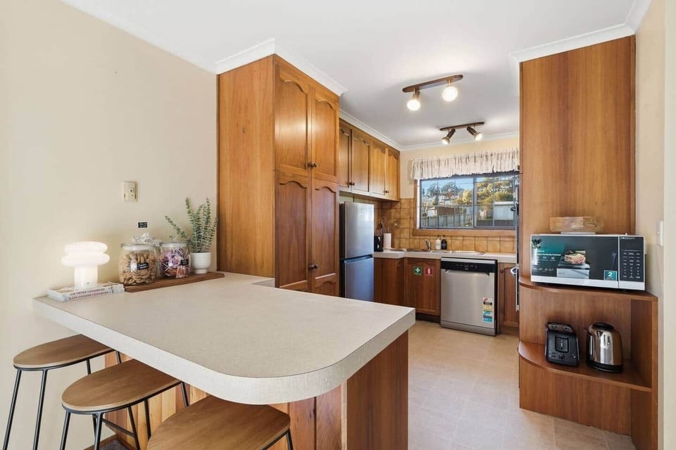 Bright open kitchen perfect for family breakfasts and holiday dinners.