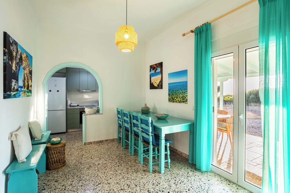 Open dining area connecting seamlessly to the outdoor terrace.