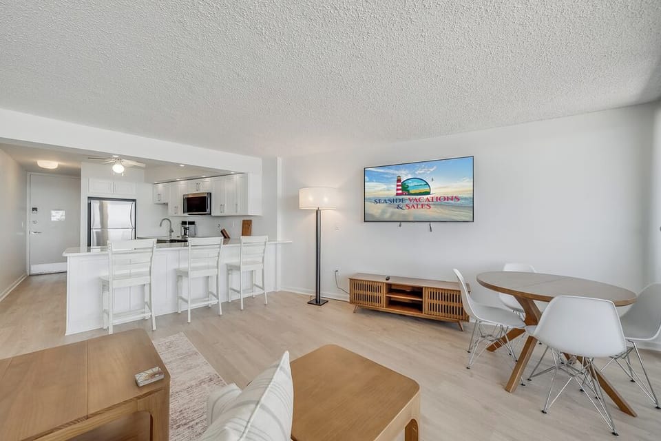 Catch up on your favorite shows or keep the conversation going across the open floor plan.