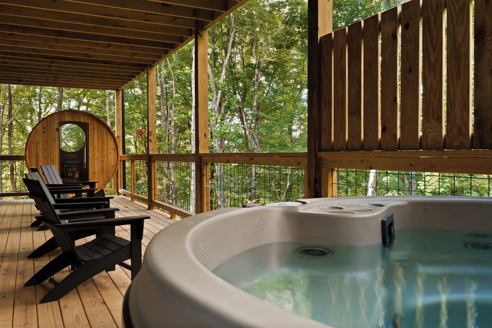 Your private lower-level wellness retreat features a relaxing hot tub and traditional sauna—perfect for unwinding after a day of hiking, exploring Gatlinburg, or adventuring in the Smokies.
