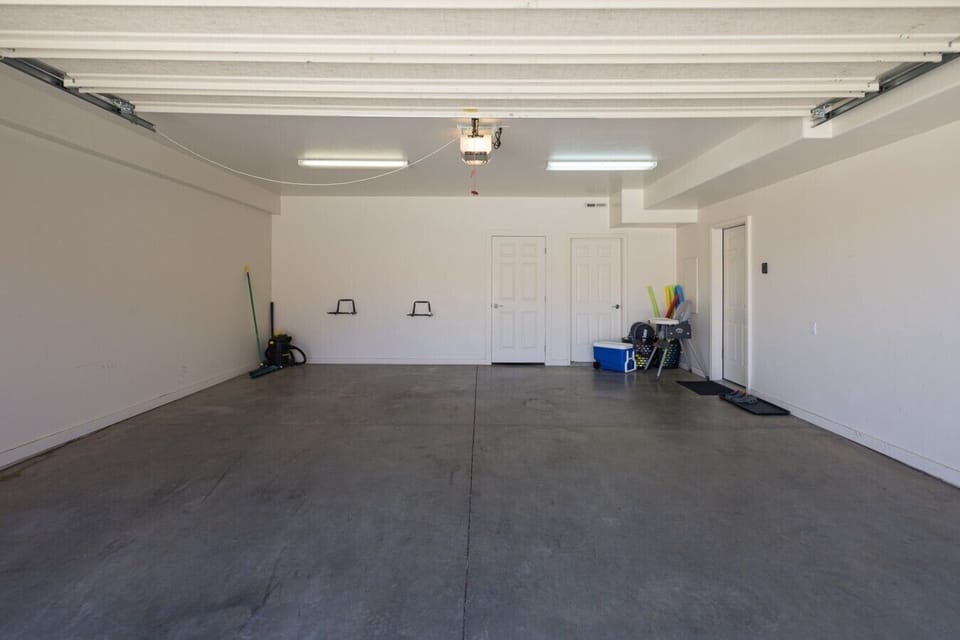 Extra-large two-car garage with plenty of space for vehicles, mountain bikes, UTVs, rafting gear, and all your outdoor adventure equipment. A rare convenience for Moab travelers exploring nearby trails.