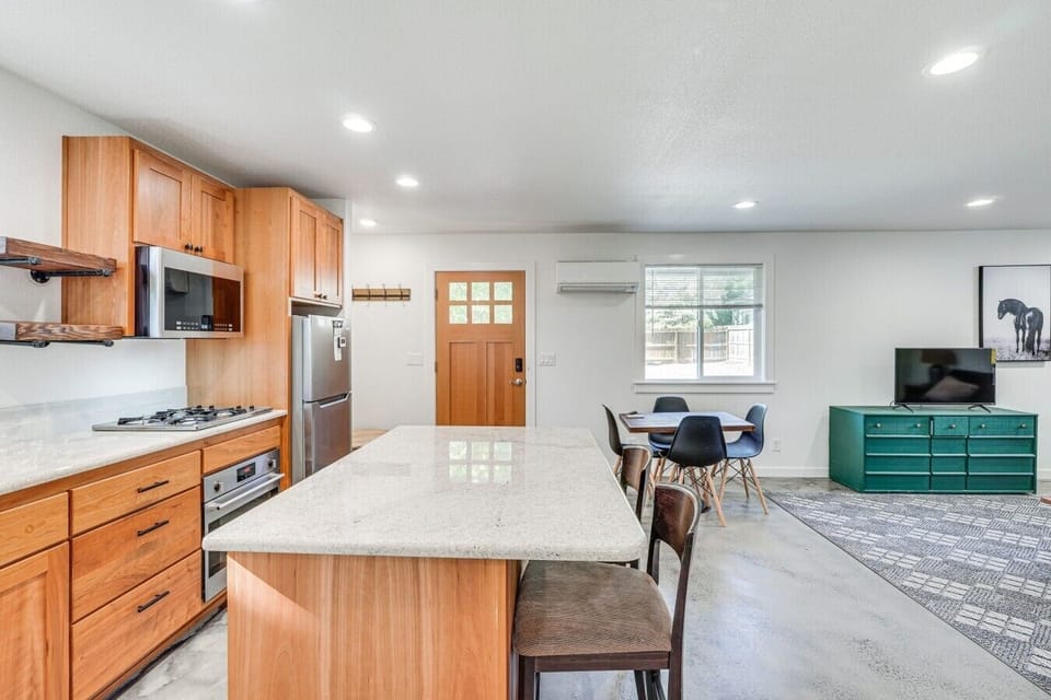 Kitchen | Island Seating, Quartz Counters & Open Living Area
