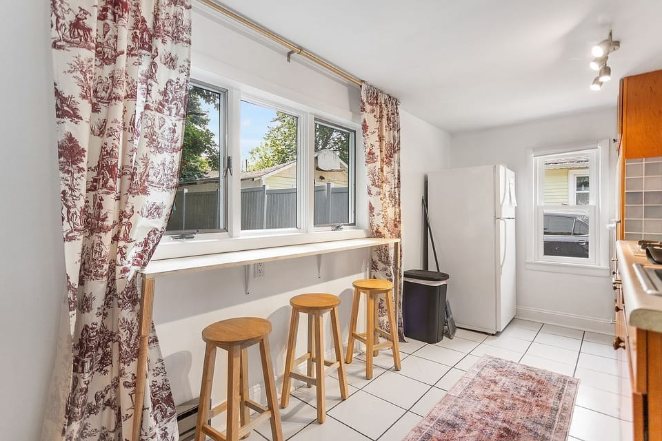 The South Apartment galley kitchen has all appliances and utensils provided.