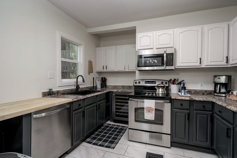 Bright modern kitchen with stainless appliances and ample counter space