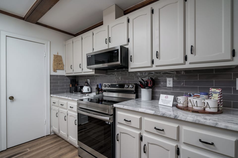 Bright updated kitchen with stainless appliances and stylish finishes