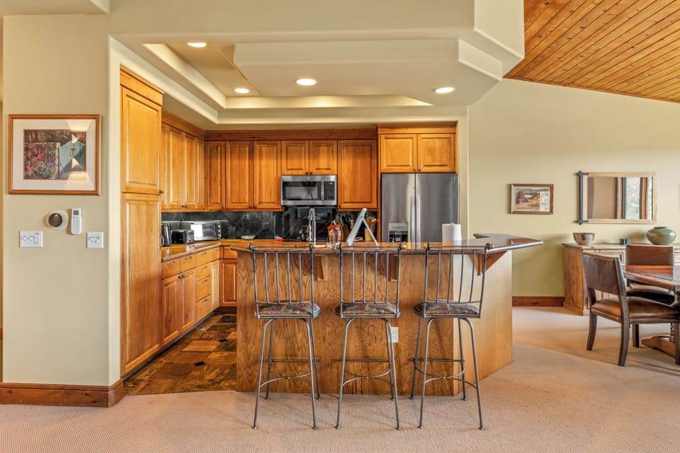 Gather around the breakfast bar for coffee and conversation