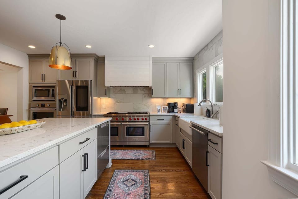With open sightlines and timeless finishes, this kitchen makes every meal feel like an occasion.