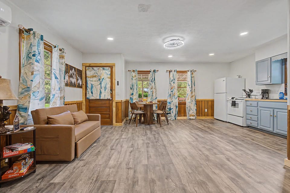 Living Room: Bright and airy space, perfect for games and relaxation with scenic views!