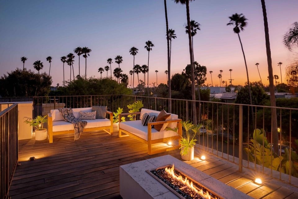 Gather around the fire pit or fire up the grill on this one-of-a-kind rooftop space.