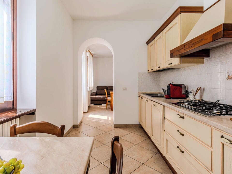 Interior Design, Flooring, Wood, Floor, Kitchen, Countertop, Room, Cabinetry, Ceiling, Furniture