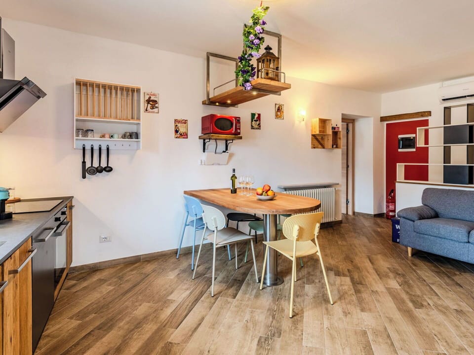 Furniture, Interior Design, Flooring, Floor, Wood, Ceiling, Wood Flooring, Room, Lighting, Table