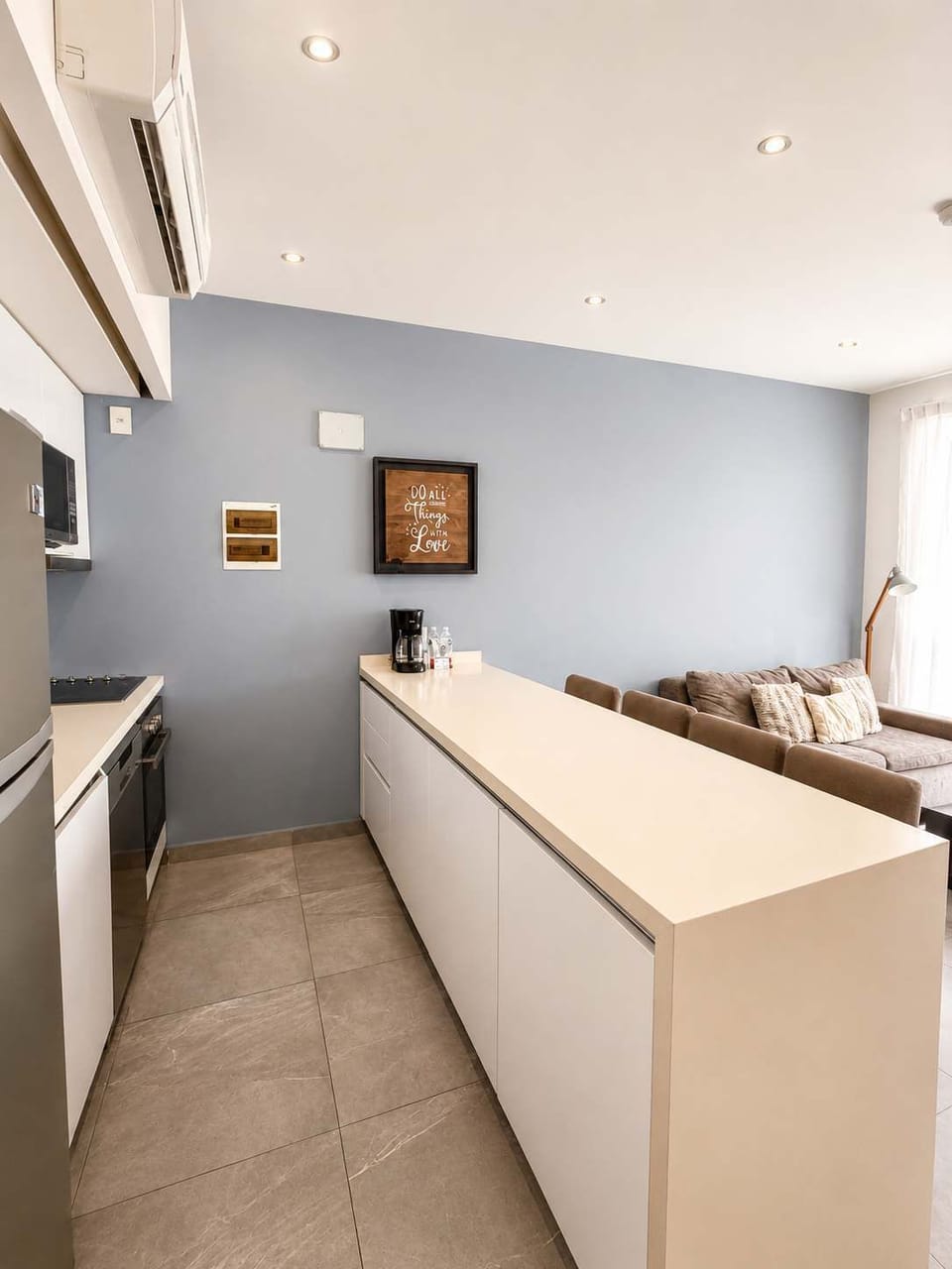 Fully equipped kitchen with modern appliances.