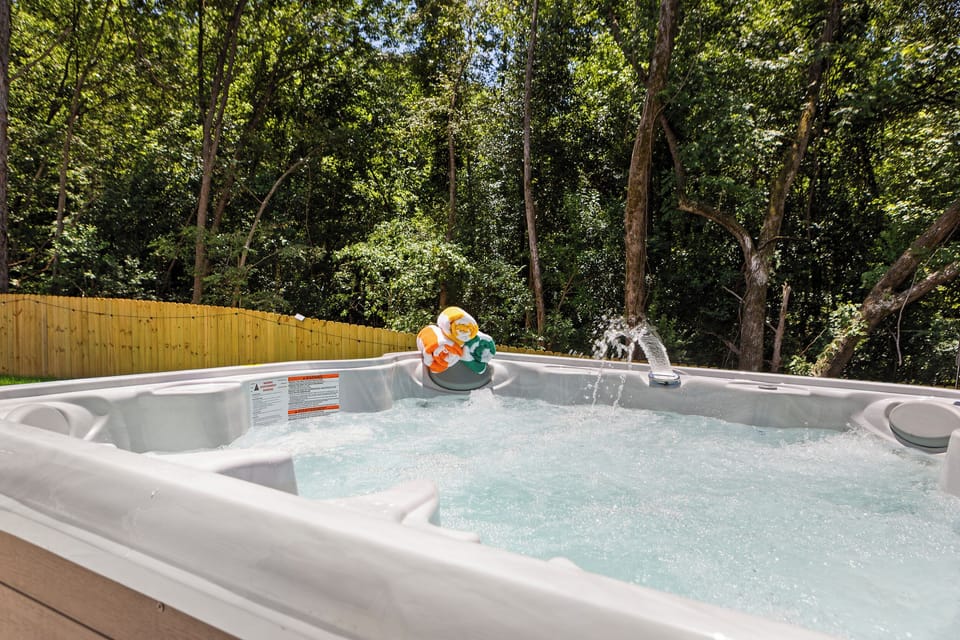 Private forest hot tub with bubbling jets and a peaceful wooded backdrop