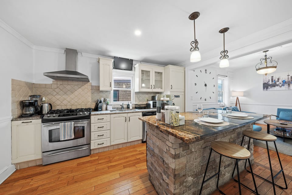 Bright open kitchen with island seating and stylish finishes