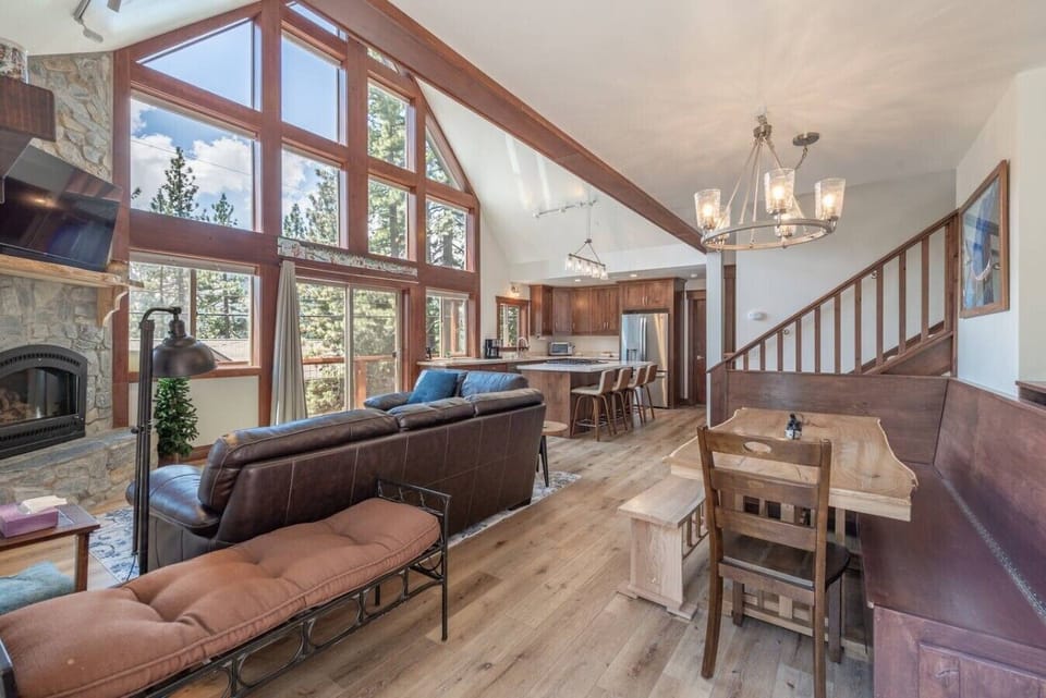Vaulted ceilings and a cozy stone fireplace