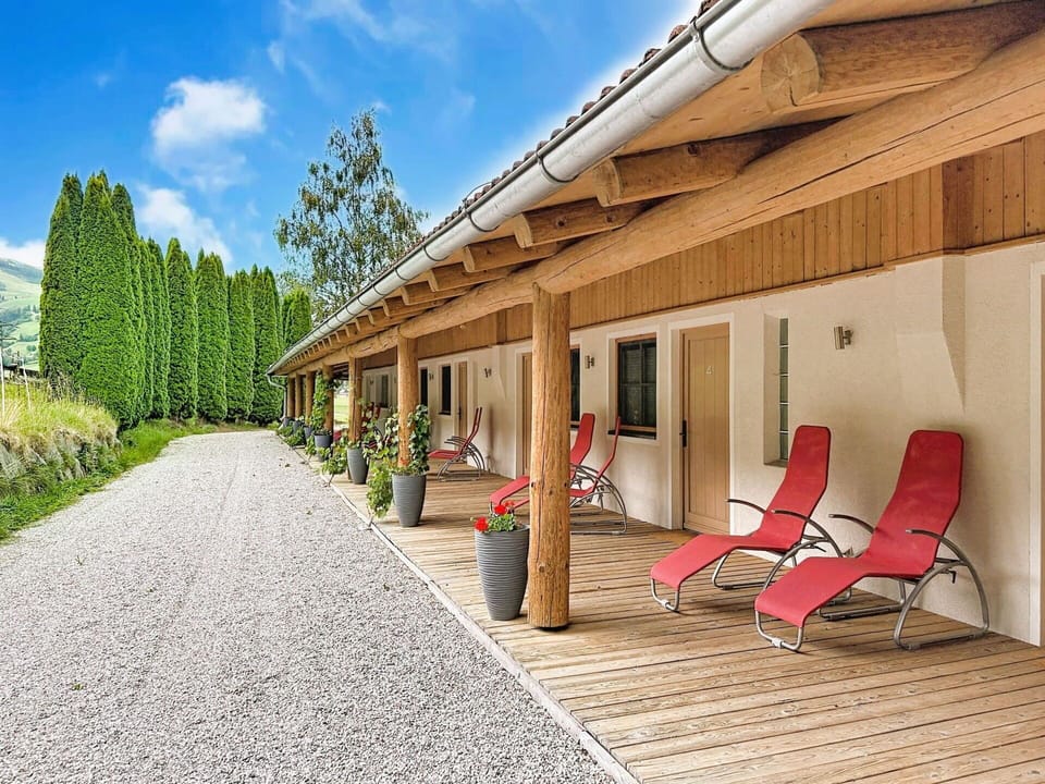 Wood, Cottage, Shade, Hardwood, Wood Stain, Eco Hotel, Lumber, Porch, Houseplant, Deck