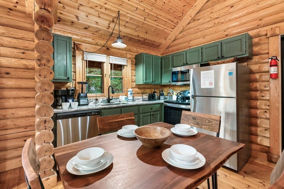 Fully equipped kitchen and dining area with Ninja blender, Reverse osmosis fresh water drinking system, Keurig Duo coffee maker, crock pot and everything else you would need to make a great home cooked meal.