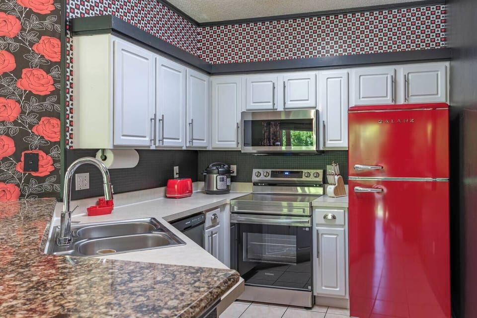 Enjoy quality time in this stylish kitchen, where every meal becomes a fun and memorable experience with your loved ones.