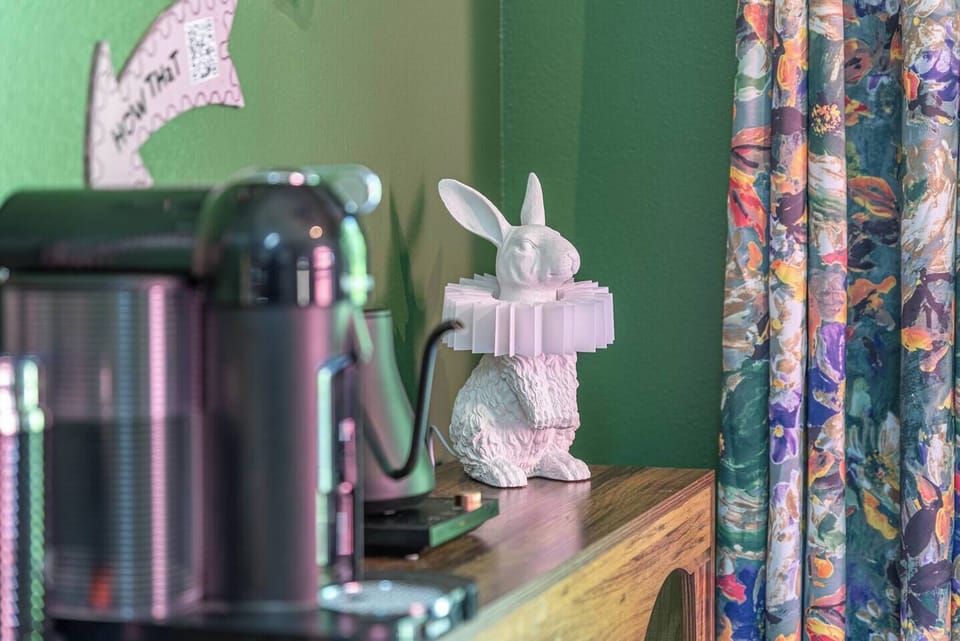 Enjoy a cozy coffee moment with friends and family in this charming corner, where thoughtful details and playful décor create the perfect setting to start your day together or unwind with a warm drink and great conversation.