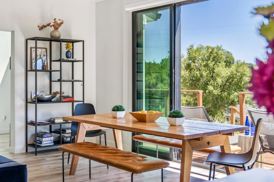 Indoor dining with seamless access to the outdoor deck.