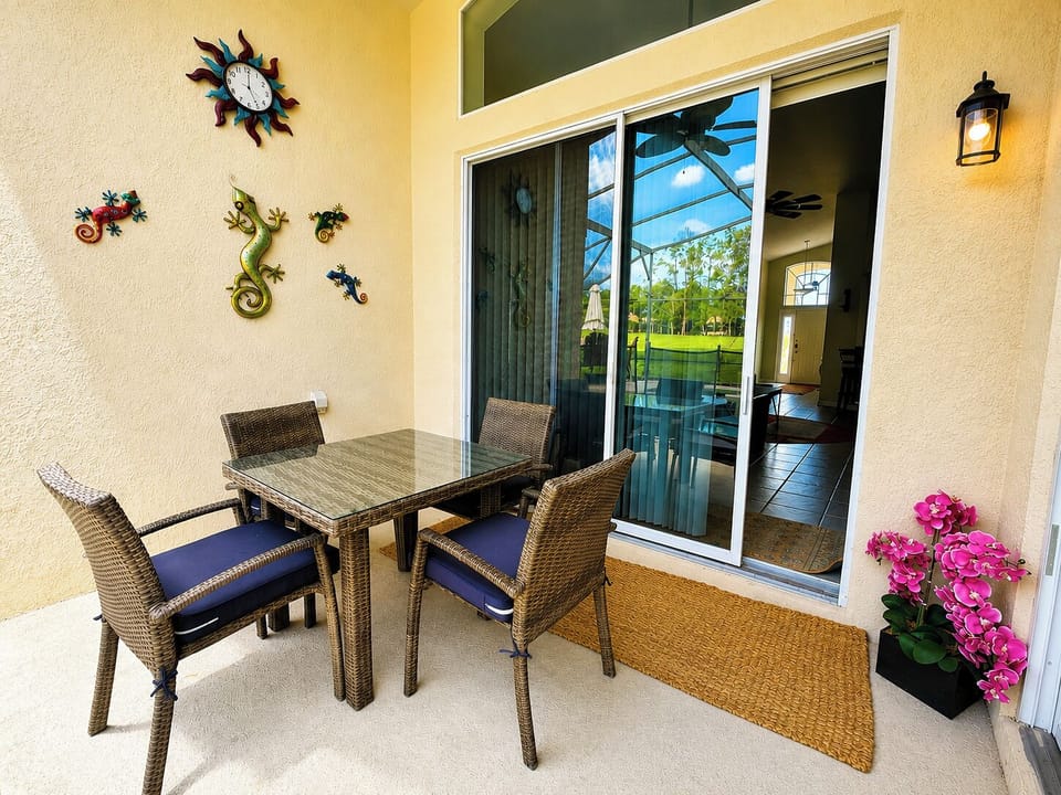 Pool area showing the other outdoor dining table