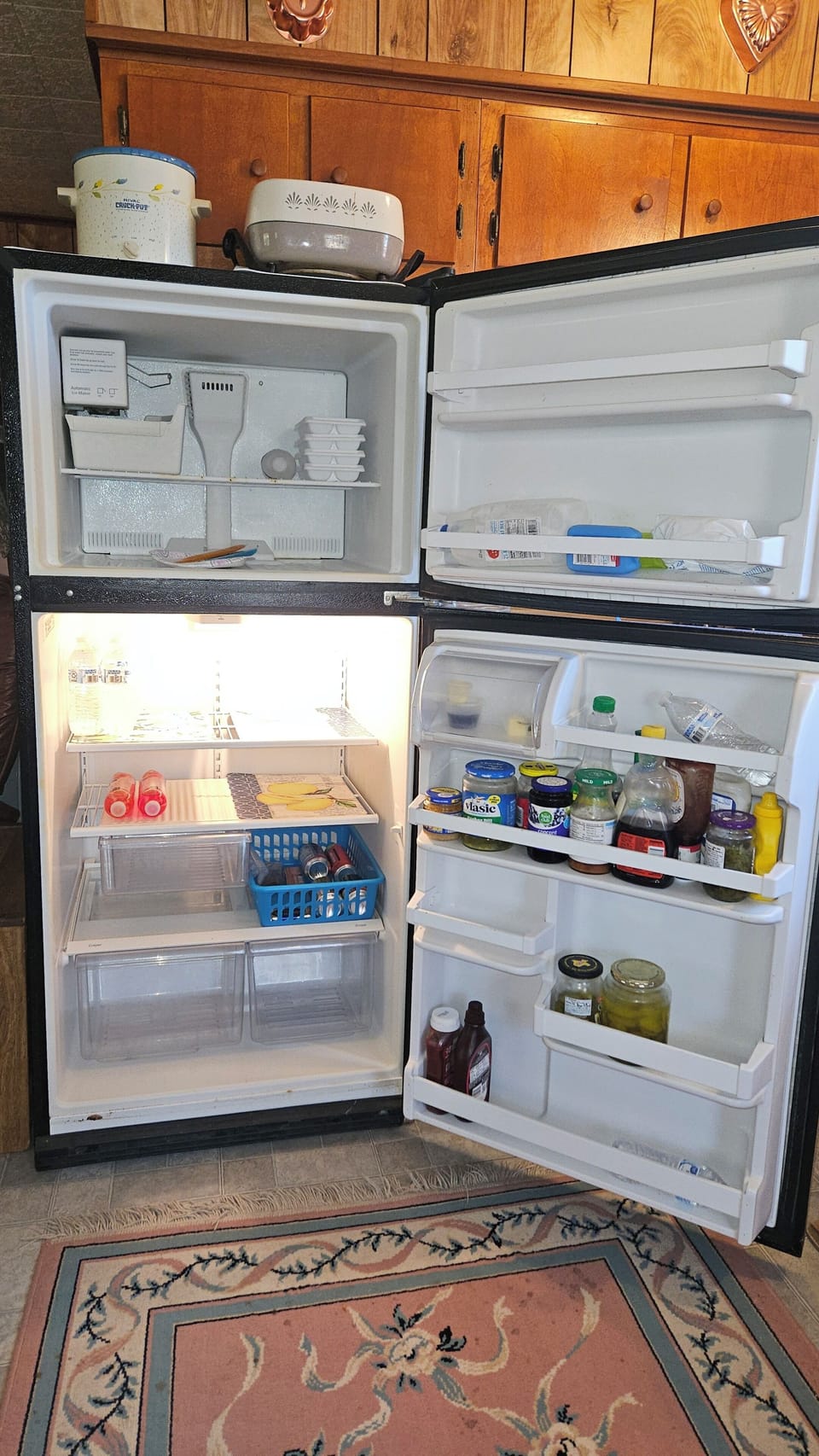 Fridge and freezer. Condiments may be there, we discard routinely.