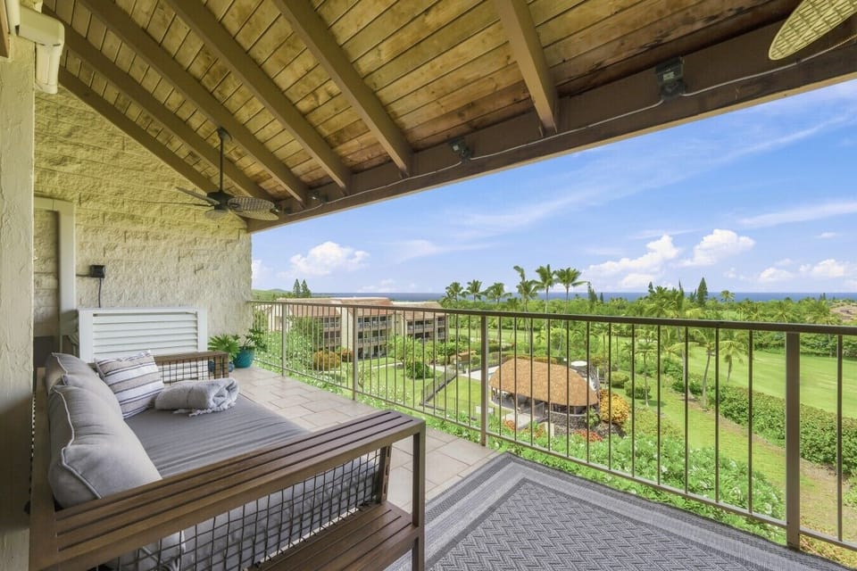 Expansive covered lanai overlooking the fairway and Pacific horizon