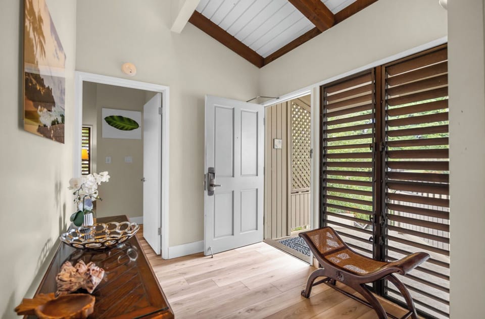 Unit 1: Enjoy a bright foyer featuring vaulted ceilings, wood accents, and stylish décor that sets the tone for the home.