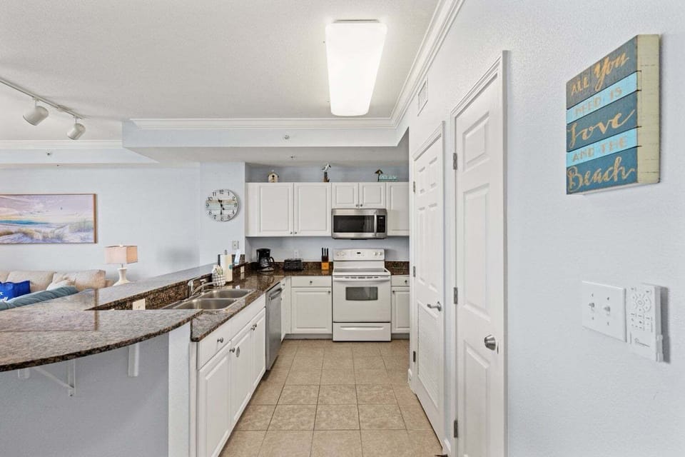 Fully applianced kitchen with coffee essentials and cooking essentials for your culinary needs