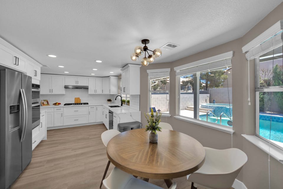 Cook with ease in a fully equipped kitchen featuring premium appliances and stunning quartz countertops.
