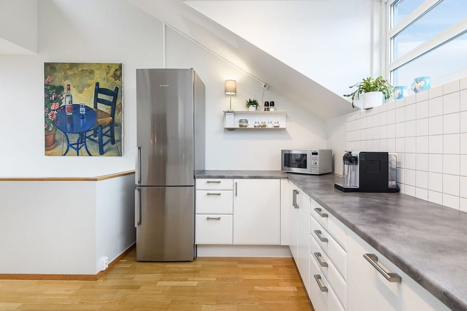​​Functional, fully-equipped kitchen with plenty of counter space, ideal for home-cooked meals