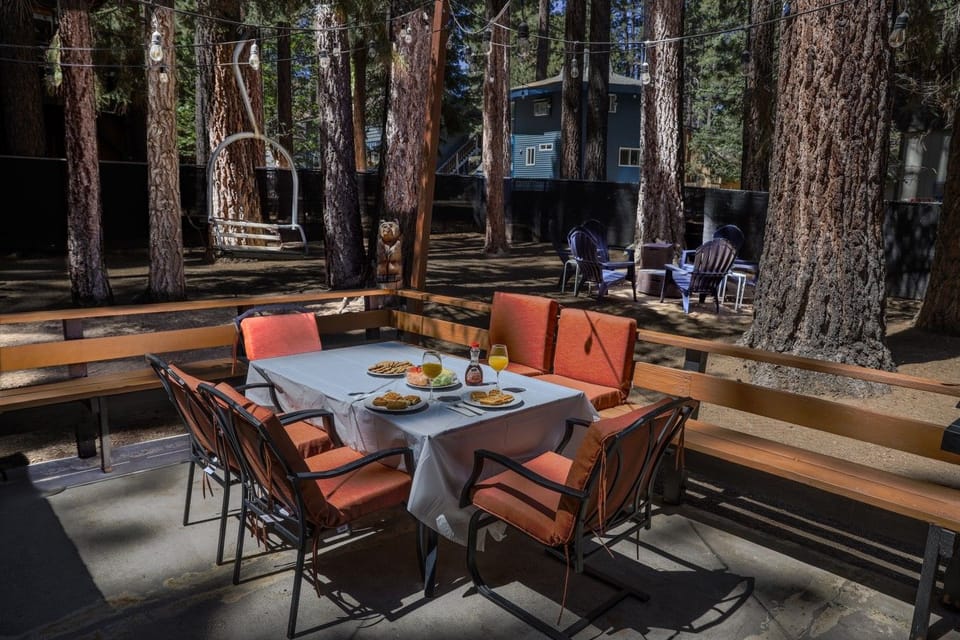 Patio | Dining Table | String Lights & Forest View