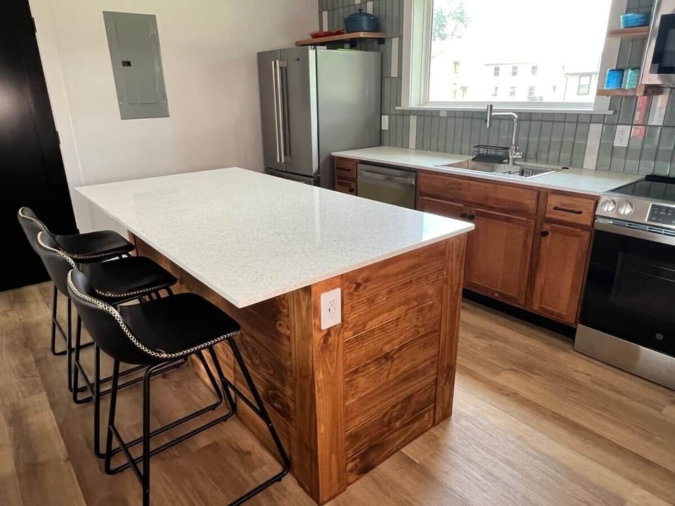 Island with bar stools