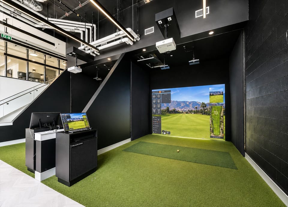 Modern indoor golf simulator with premium entertainment space
