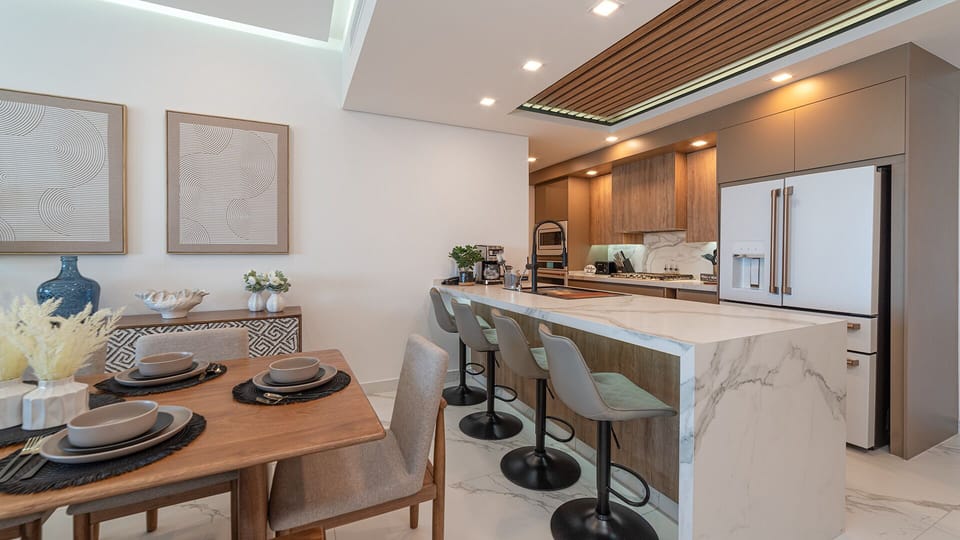 The kitchen and dining table.