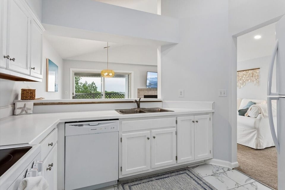 Spacious kitchen with modern appliances.