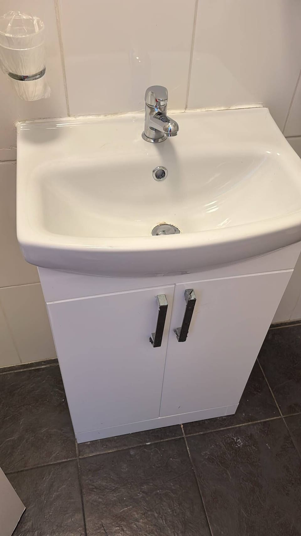 Compact modern bathroom vanity with storage and clean finishes