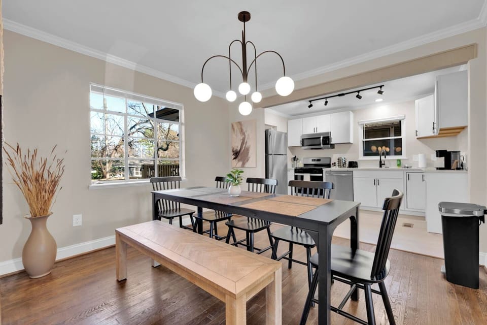 Open to the kitchen and living room, the dining area keeps everyone connected—making it easy to cook, dine, laugh, and make memories together at The Scandic.